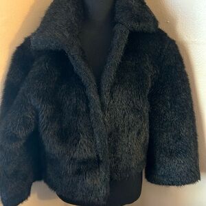 Black faux fur short jacket. Gently used